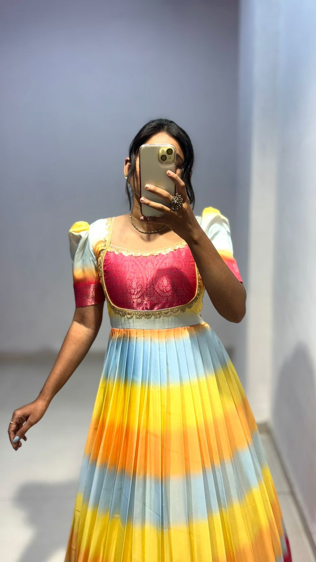 Look at beautiful pastels multicoloured dress crafted with nice detailing of lace on neck with grand border!! And duppta with zari border!