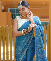 Captivating Silk Floral Design Teal Blue Color Saree